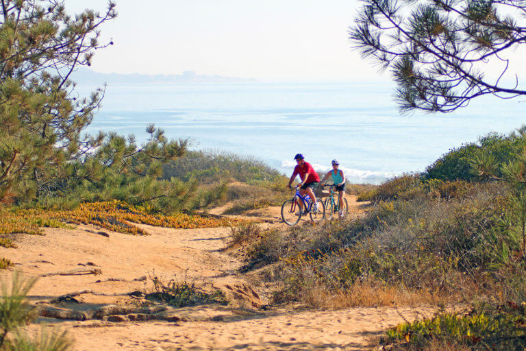 couple biking at Torrey Pines State Park