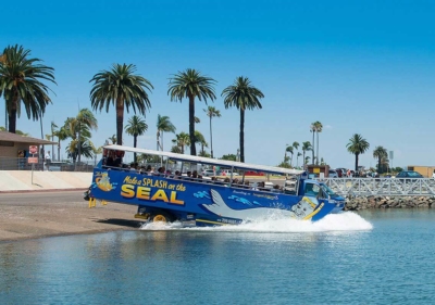 image of seal tour vehicle splashing into the harbor